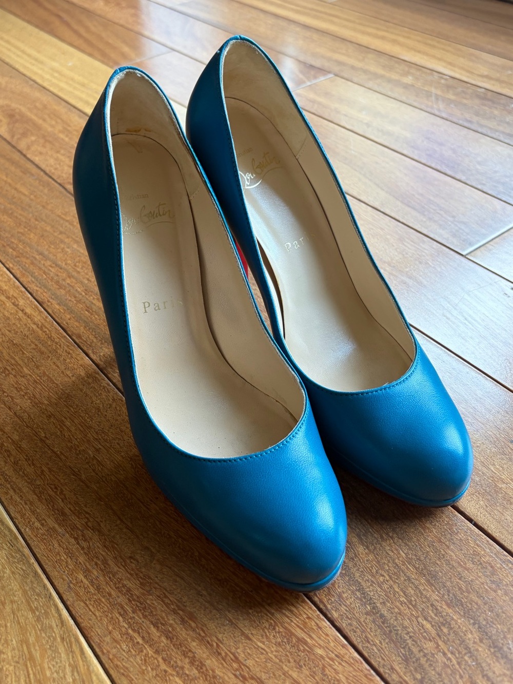 Christian Louboutin turquoise blue leather pumps